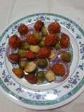 Tomates cherry explotados con repollitos