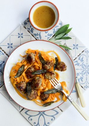 A picture of Honey and mustard pork meatballs with pumpkin tagliatelle topped with crispy sage.