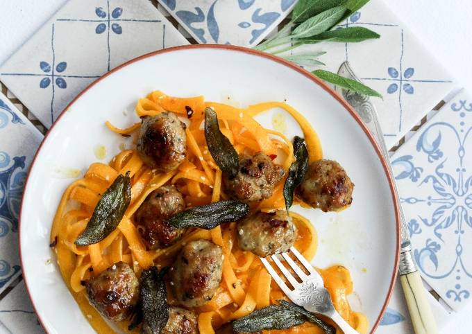 Honey and mustard pork meatballs with pumpkin tagliatelle topped with crispy sage