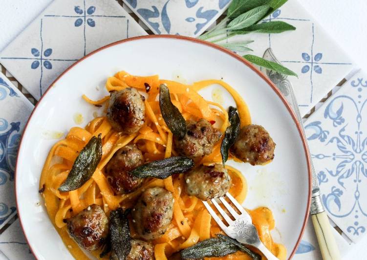 Honey and mustard pork meatballs with pumpkin tagliatelle topped with crispy sage
