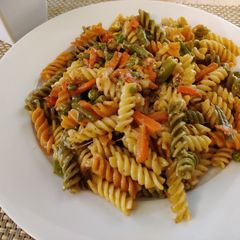 A picture of 3 colour fussili pasta.