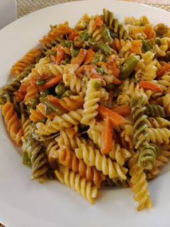 A picture of 3 colour fussili pasta.