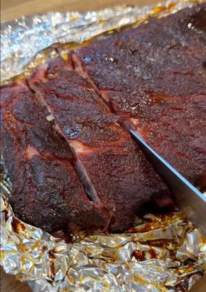 A picture of Smoked St. Louis Style Ribs on the Kamado Joe.