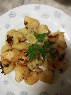 Una foto de Patatas a la barbacoa en el horno
