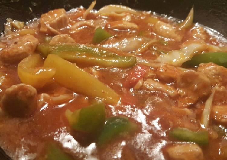 Singaporean curry served with rice, spaghetti and mayo sauce