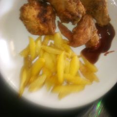 A picture of Broasted chicken + fries.