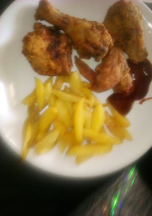 A picture of Broasted chicken + fries.