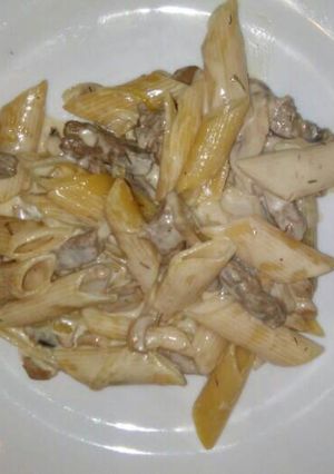 Una foto de Pasta con salsa champiñones