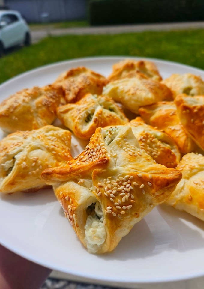 A picture of Fresh onions & Feta cheese pastry pockets.