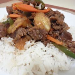 A picture of Spicy mutton/beef with pineapple chunks.