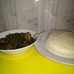 A picture of Afang soup with tuwo Masara(corn flour).