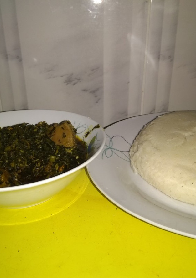 A picture of Afang soup with tuwo Masara(corn flour).