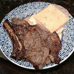 A picture of Squirrel's grilled ribeye steak.
