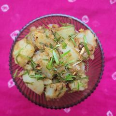 A picture of Green garlic potatoes.