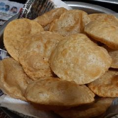 A picture of Wheat flour puri.