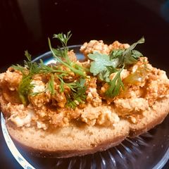 A picture of Masala crumbled tofu on toast.