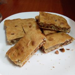 A picture of Banana and peanuts cake.