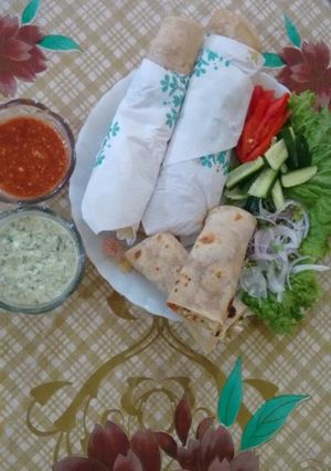 A picture of Hot and spicy chicken paratha roll.