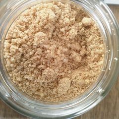 A picture of Vegan Parmigiano topping.