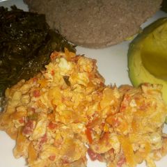 A picture of Eggs with carrots.