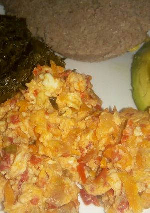 A picture of Eggs with carrots.