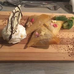 A picture of Chocolate, Turkish delight and pistachio phyllo parcels.
