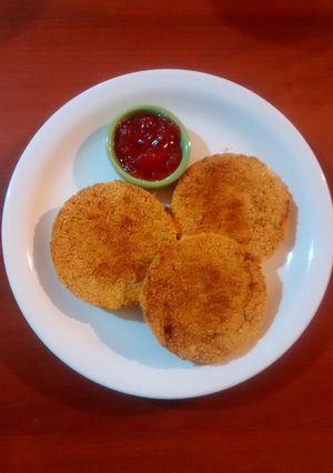 Una foto de Hamburguesas de porotos (del que más te guste) vegetarianas
