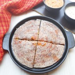A picture of Ragi Dosa Sandwich Pizza.
