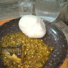 A picture of Tuwan shinkafa and okoro soup.