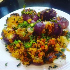 A picture of Stuffed onion with poha stuffing.