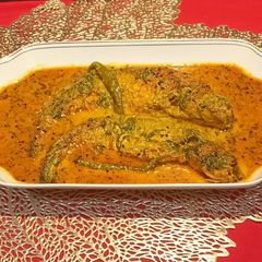 A picture of Sorshe/ mustard Paste Pabda Mach/ Fish.