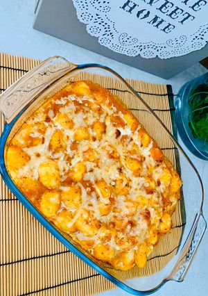 Une photo de Gratin de gnocchis tomates & parmesan