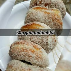 A picture of Doughnut coating with coconut.