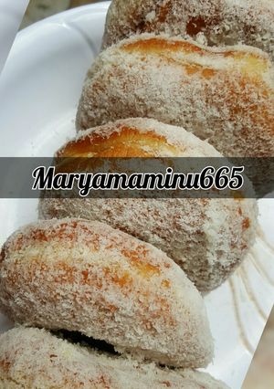 A picture of Doughnut coating with coconut.