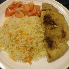 A picture of Pan grilled pork with carrot rice.