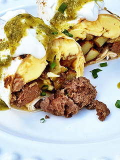 A picture of Wagyu Beef Sausage, Potato, and Egg Breakfast Burritos.
