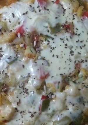 Una foto de Tarta de coliflor con verduras y snack con los sobrantes