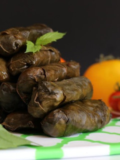 A picture of Stuffed grape Leaves With Oil.