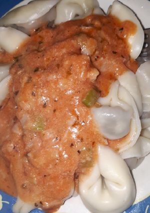 Una foto de Capeletinis con salsa mixta