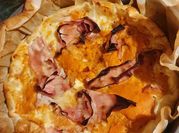 Una foto di pasta zucca scamorza