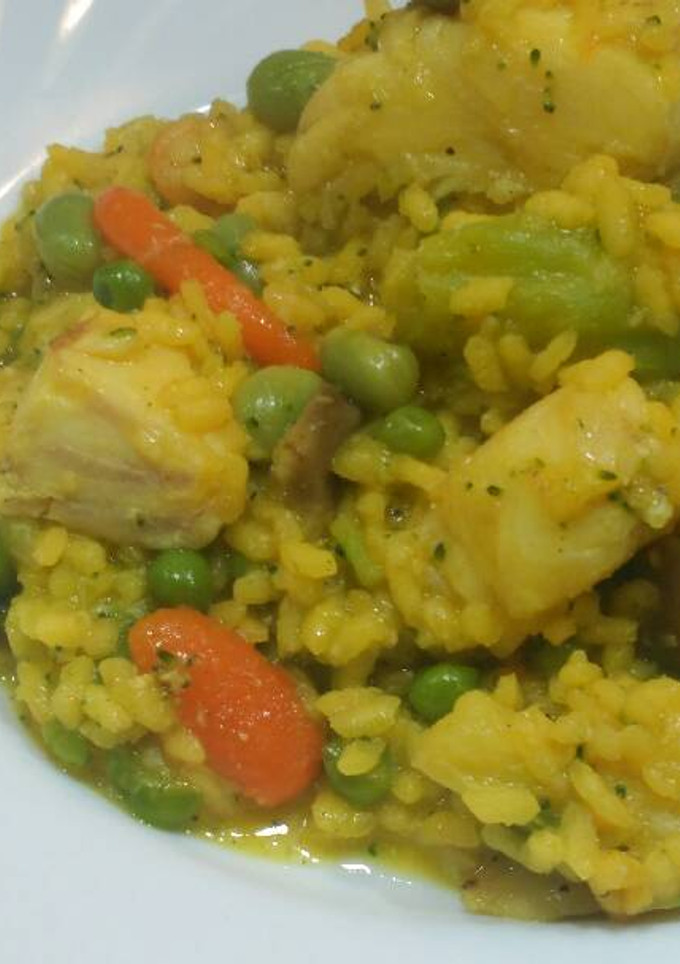 Una foto de Arroz con verduras y merluza