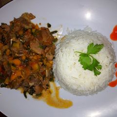 A picture of Boiled Rice with beef stew.