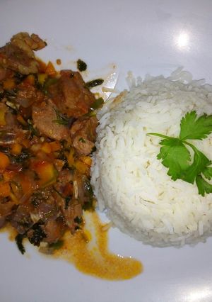 A picture of Boiled Rice with beef stew.