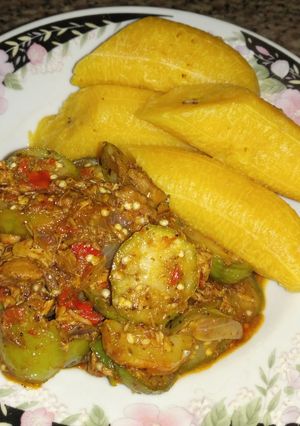 A picture of Garden egg sauce and plantain.