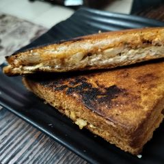 A picture of Leftover aloo bharta sandwich.