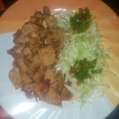 Fried awara with sauce and cabbage A picture of Fried awara with sauce and cabbage.