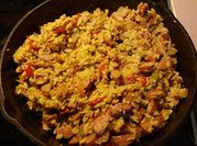 A picture of kielbasa and rice