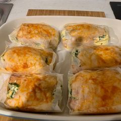 A picture of Chicken stuffed with cream cheese and spinach.