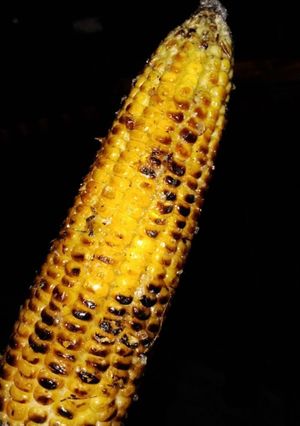 A picture of Grilled corn on the cob 🌽🔥.