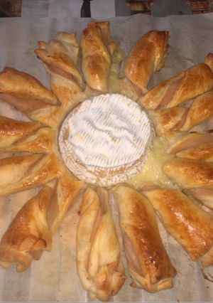 Una foto de Sol de queso y pavo